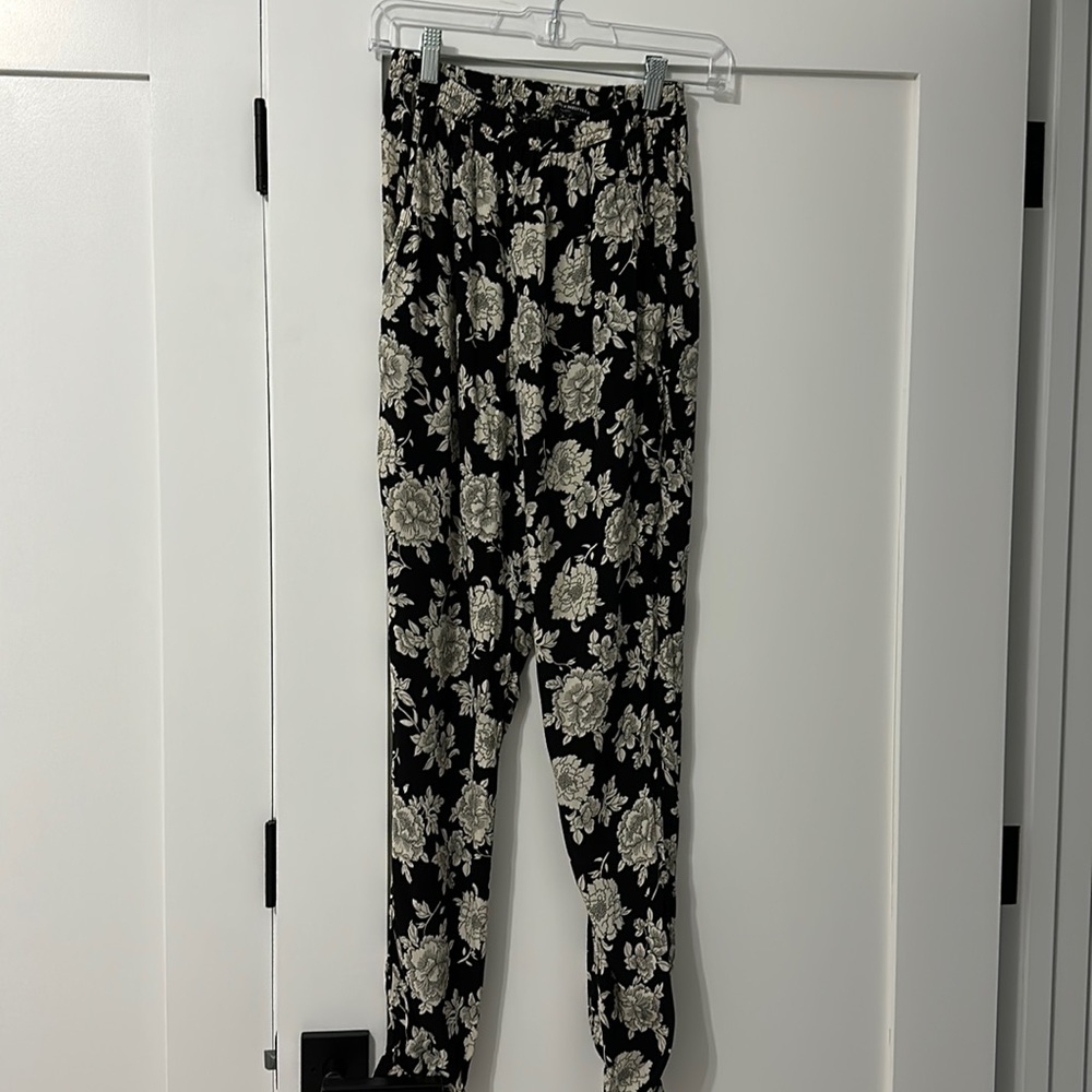 Black and white floral jogger style pants